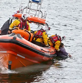 rescue boat saving a person